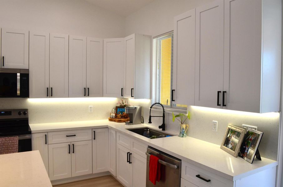 Furnished interior view inside a new home in , Clewiston (Image 16).