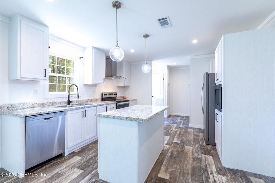 Furnished interior view inside a new home in , Lake Butler (Image 10).