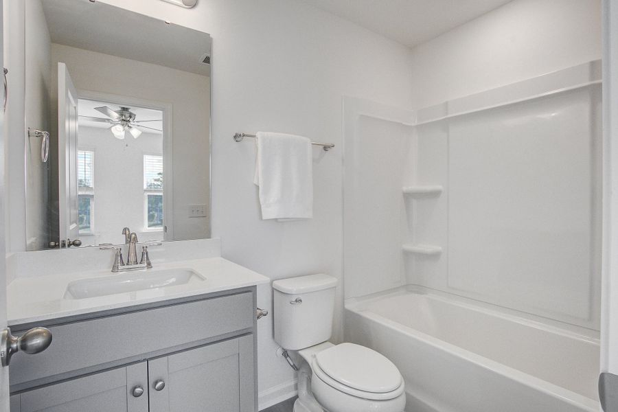 Furnished interior view inside a new home in Clear Springs Townhomes, North Charleston (Image 24).
