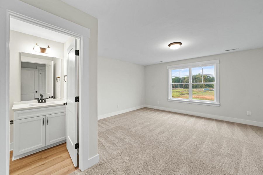 Spacious, unfurnished interior of a new home in Monterra, Kernersville (Image 47).