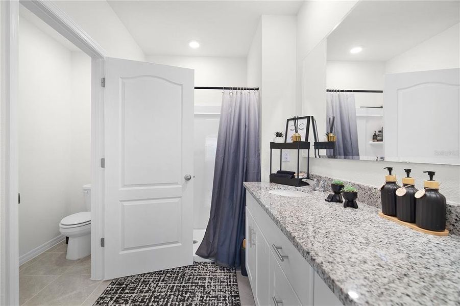 Furnished interior view inside a new home in Kindred, Kissimmee (Image 23).