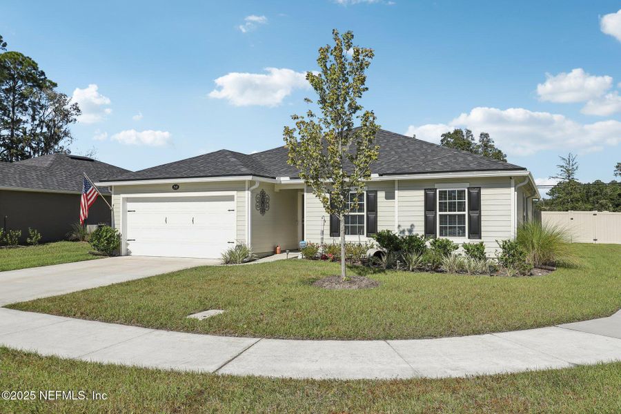 Front exterior of a new home in Creekside Manor, Jacksonville, FL, highlighting curb appeal (Image 1). Front exterior of a new home in Creekside Manor, Jacksonville, FL, highlighting curb appeal (Image 1).