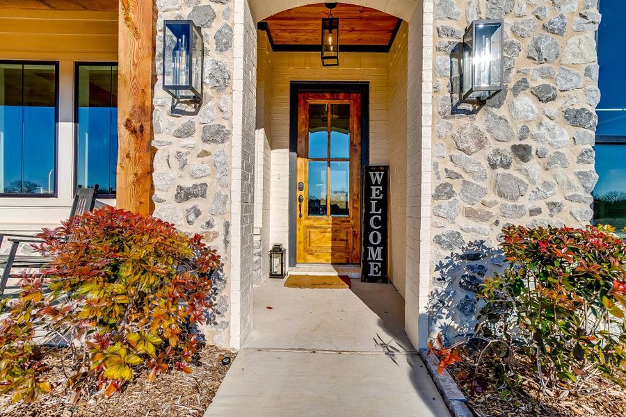 Representative exterior details of a home built from the The Avery by Elmwood Custom Homes in Matthews Farm, Venus (Image 12). Representative exterior details of a home built from the The Avery by Elmwood Custom Homes in Matthews Farm, Venus (Image 12).