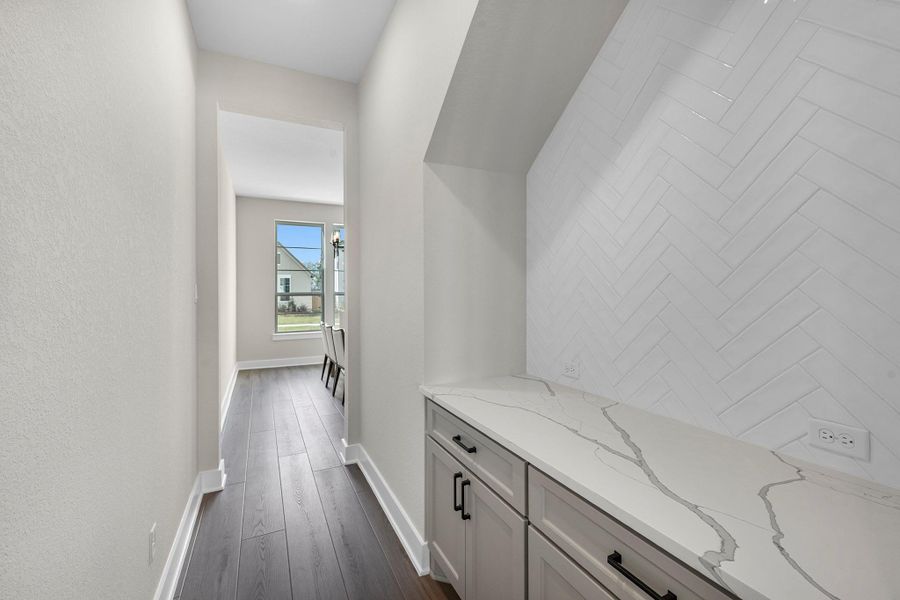 Furnished interior view inside a new home in Bridgeland, Cypress (Image 23).