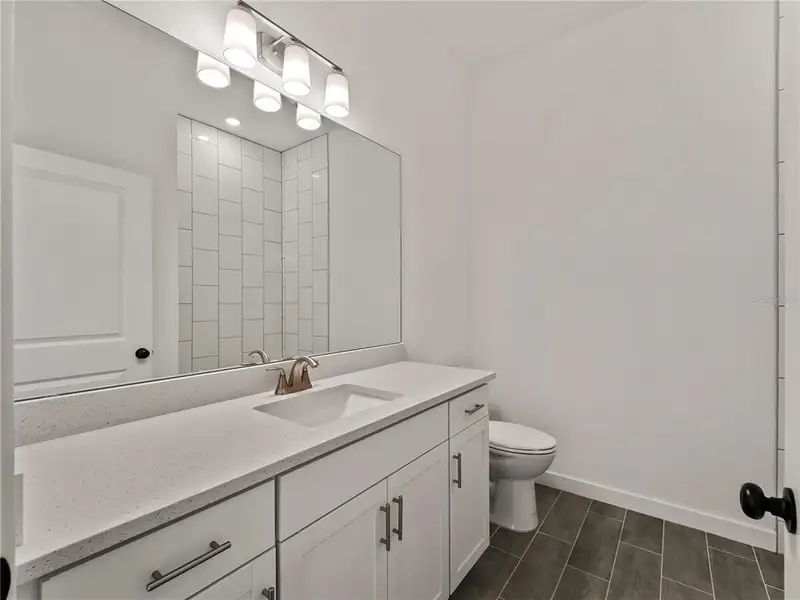 Furnished interior view inside a new home in , North Port (Image 9).