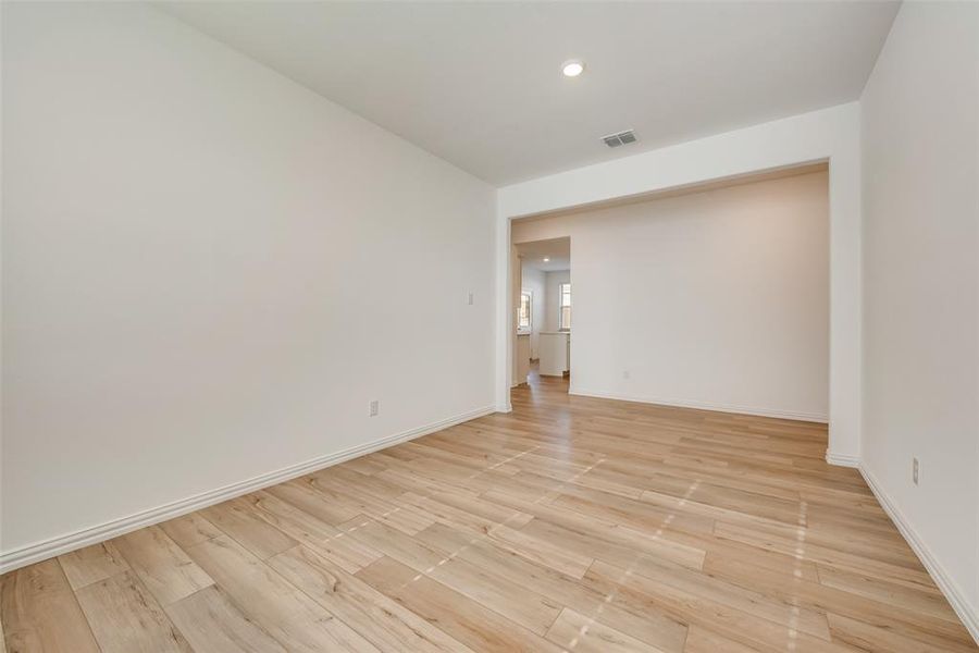 Unfurnished room featuring light hardwood / wood-style flooring