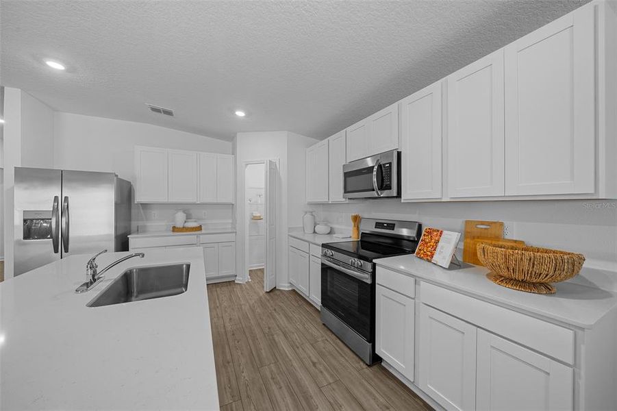 Furnished interior view inside a new home in Tara Forest East, Alachua (Image 34).