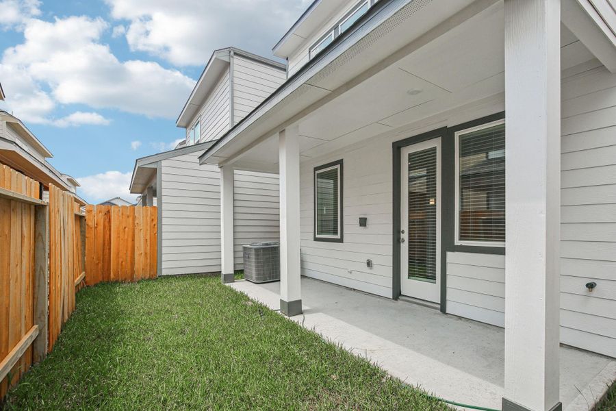 Exterior details and patio area of a home in Spring Brook Village - City Series, Houston (Image 3). Exterior details and patio area of a home in Spring Brook Village - City Series, Houston (Image 3).