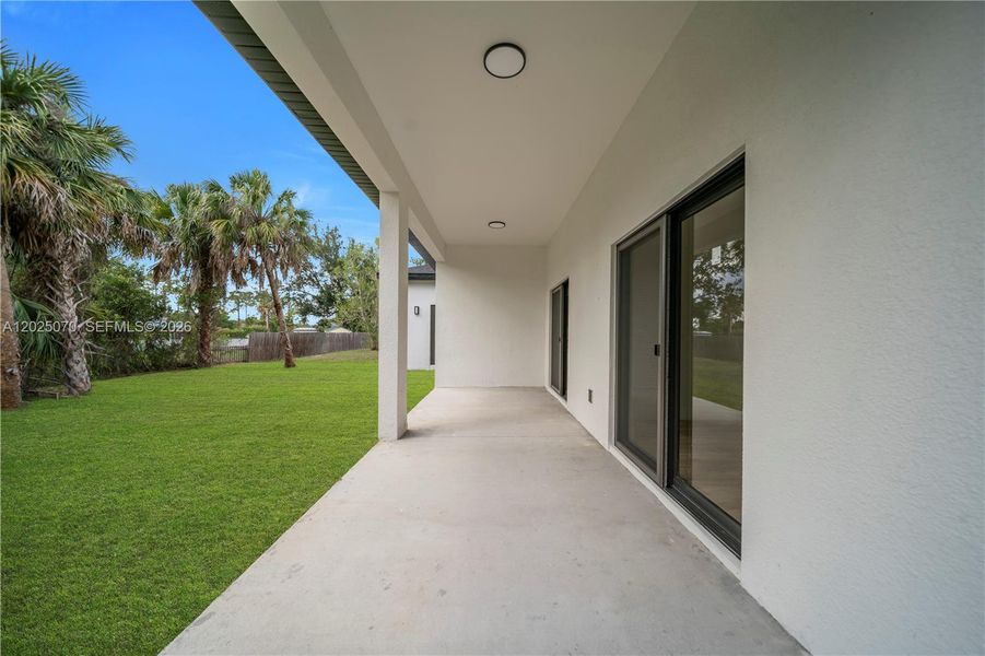 Exterior details and patio area of a home in , North Port (Image 4).