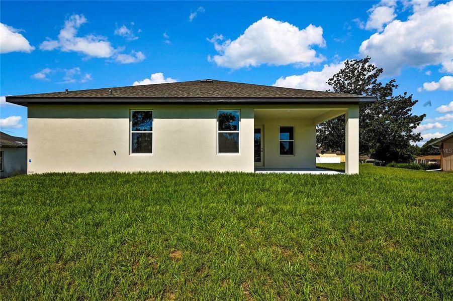 Front exterior of a new home in , Spring Hill, FL, highlighting curb appeal (Image 30).