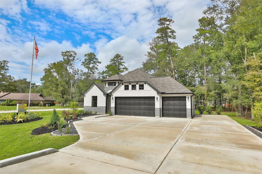 Front exterior of a new home in Roman Forest, New Caney, TX, highlighting curb appeal (Image 21).