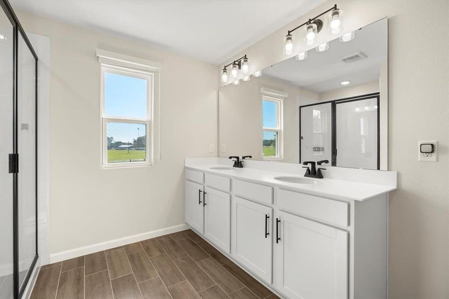 Furnished interior view inside a new home in Seasons at Lakeside Forest, Tavares (Image 19).