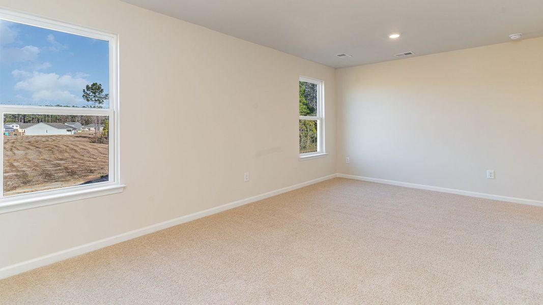 Representative unfurnished interior of a home built from the WREN by D.R. Horton in Saltgrass Landing, Winnabow (Image 25).