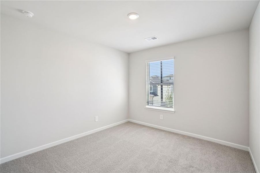 Spacious, unfurnished interior of a new home in Hawthorne Station, College Park (Image 27).