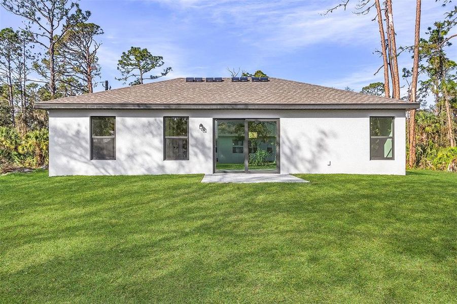Exterior details and patio area of a home in , North Port (Image 3).