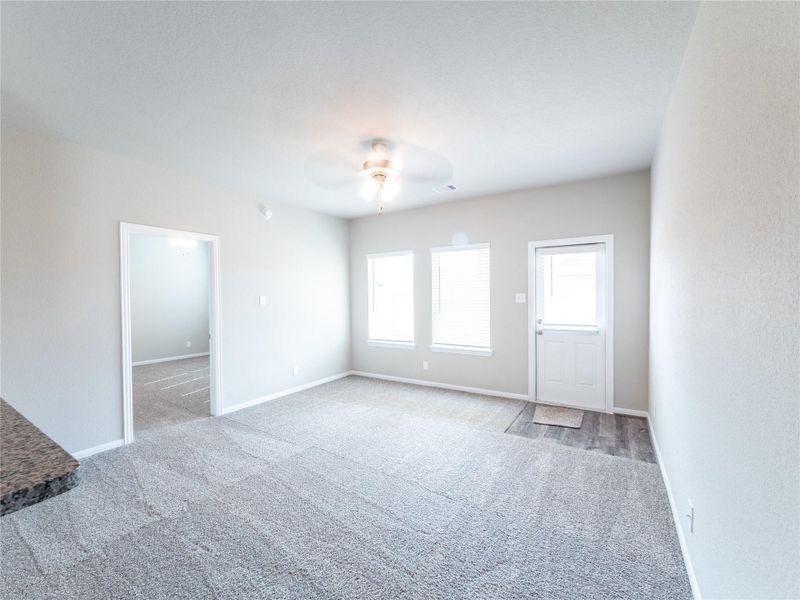 Spacious, unfurnished interior of a new home in Sweetgrass Village, Crosby (Image 8).