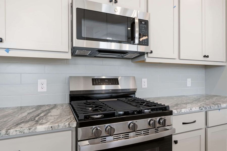 Close-up of interior finishes inside a home in Bridgeland, Cypress (Image 12).