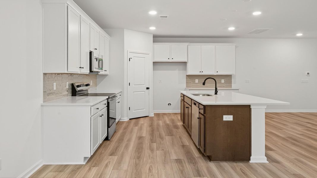 Furnished interior view inside a new home in Creekside at Andrews, Summerville (Image 11). Furnished interior view inside a new home in Creekside at Andrews, Summerville (Image 11).