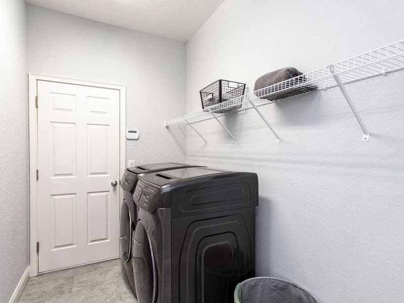 Dedicated laundry area - Westin ll home plan by Highland Homes