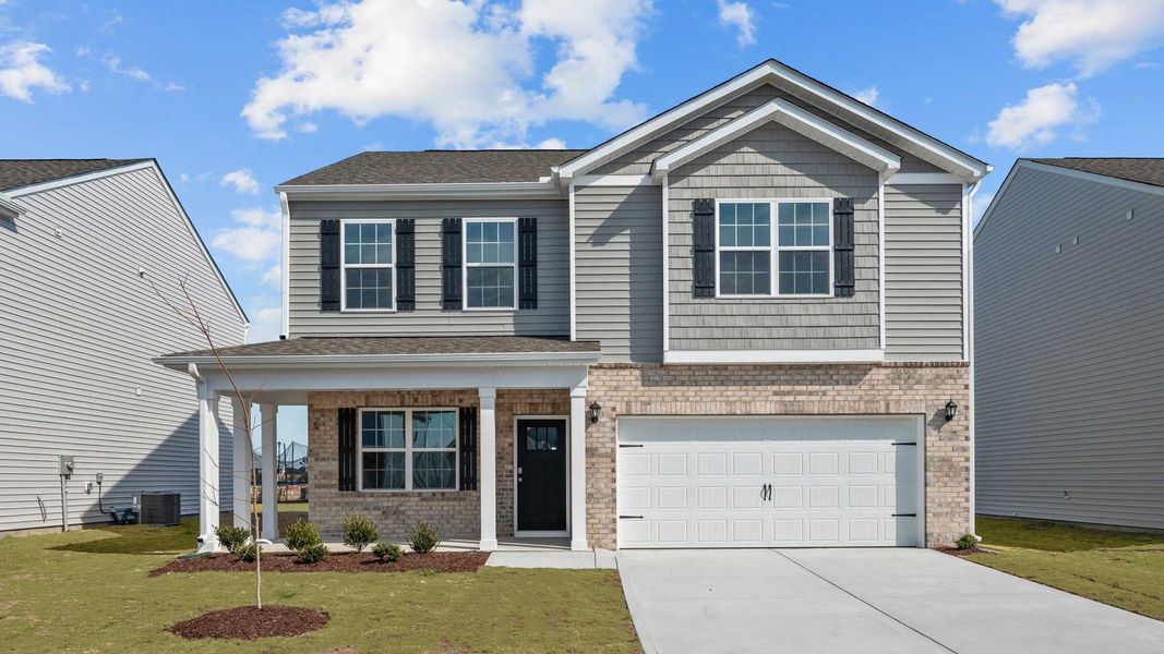 Representative exterior photo of a completed home built from the PENWELL by D.R. Horton in Ridgewood Farms, Winterville, NC (Image 2). Representative exterior photo of a completed home built from the PENWELL by D.R. Horton in Ridgewood Farms, Winterville, NC (Image 2).