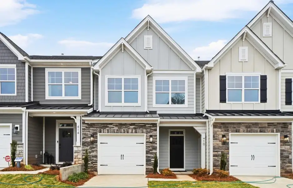 Front exterior of a new home in Blythe Mill Townhomes, Waxhaw, NC, highlighting curb appeal (Image 2).