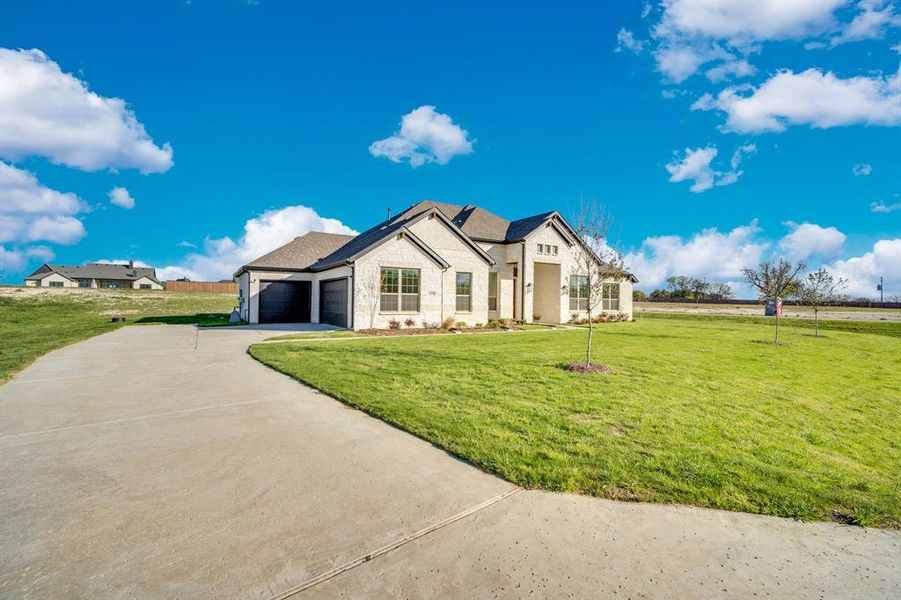 Front exterior of a new home in , Waxahachie, TX, highlighting curb appeal (Image 21).