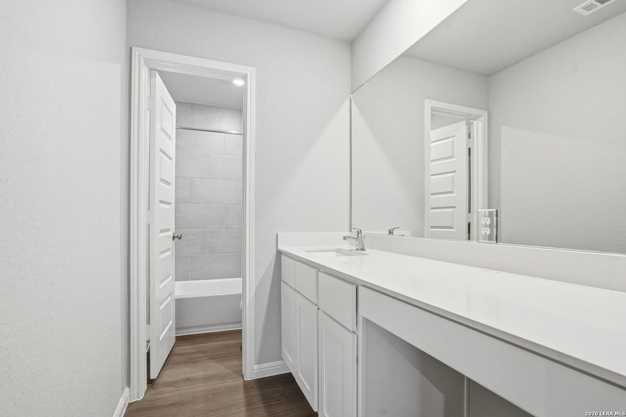 Furnished interior view inside a new home in Timber Creek, San Antonio (Image 11).
