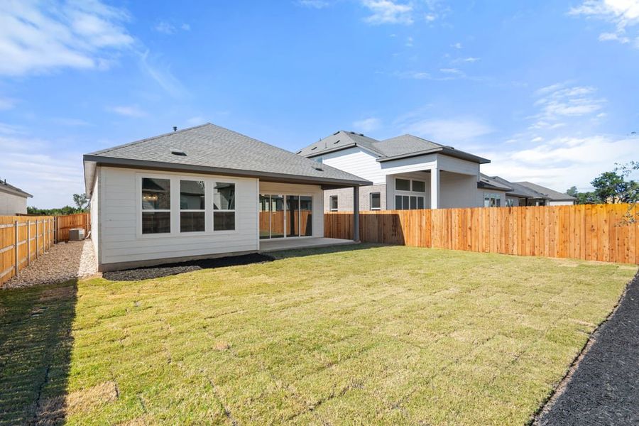 Exterior details and patio area of a home in Arbor Collection at Heritage, Dripping Springs (Image 29).