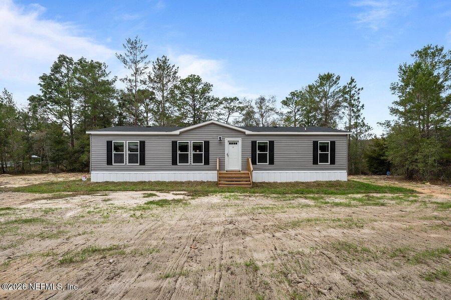 Exterior details and patio area of a home in , Hawthorne (Image 19).