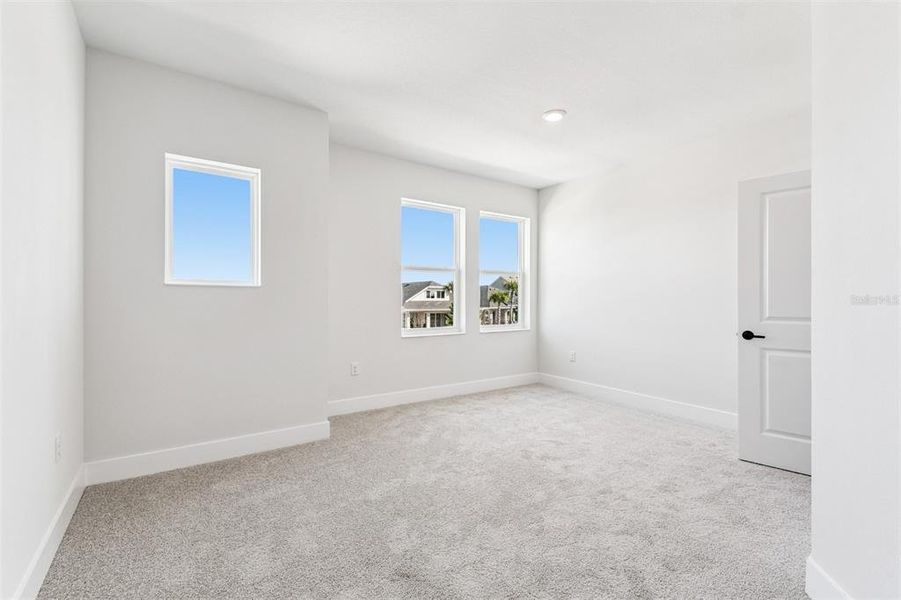 Spacious, unfurnished interior of a new home in Waterset Tradition Series, Apollo Beach (Image 34).