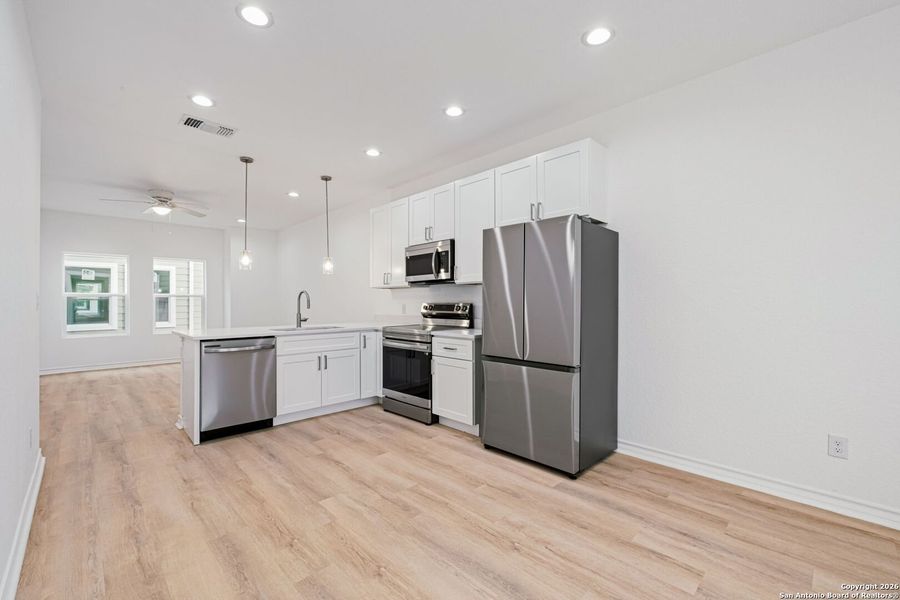Furnished interior view inside a new home in , San Antonio (Image 7).
