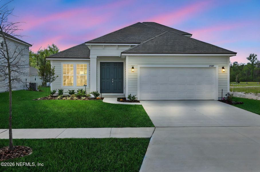 Front exterior of a new home in Jennings Farm, Middleburg, FL, highlighting curb appeal (Image 24).