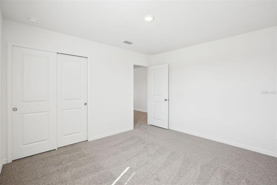 Spacious, unfurnished interior of a new home in Benton Hills - Premier Series, Brooksville (Image 24). Spacious, unfurnished interior of a new home in Benton Hills - Premier Series, Brooksville (Image 24).