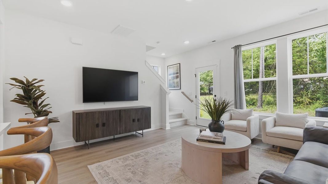 Exceptional family room with hardwood flooring in this exclusive Anderson-area villa
