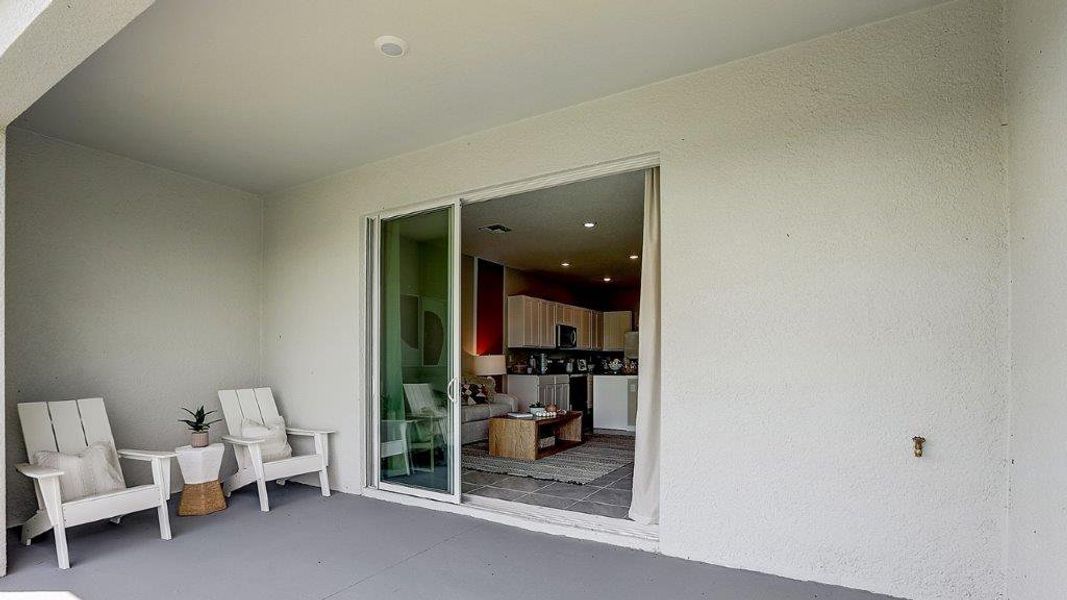 Exterior details and patio area of a home in Woodcreek, Wesley Chapel (Image 3).