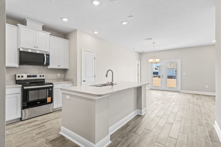 Furnished interior view inside a new home in Natureview, Freeport (Image 12).