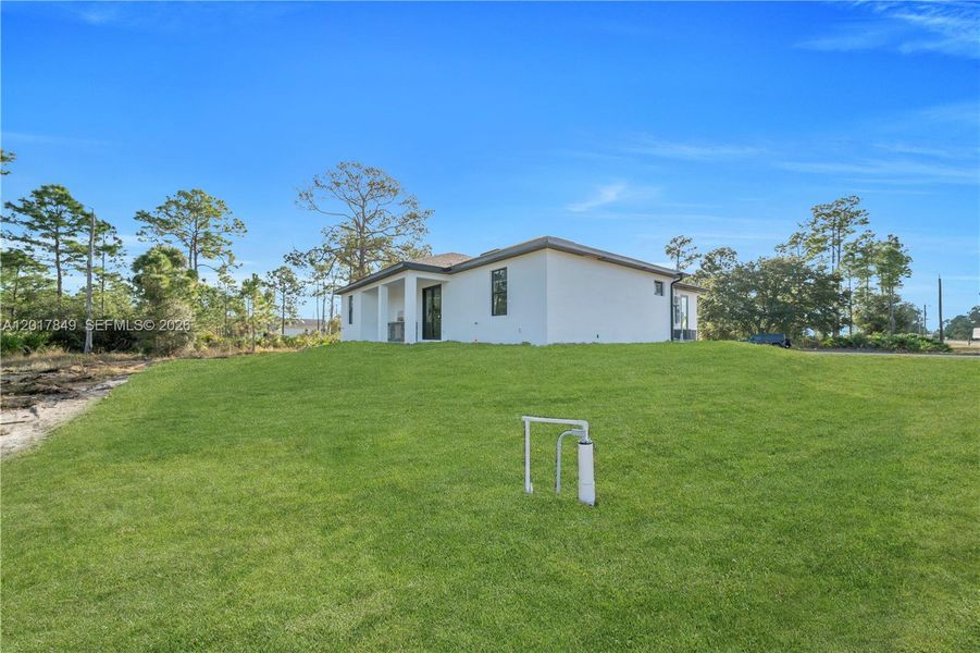 Exterior details and patio area of a home in , Lehigh Acres (Image 31).