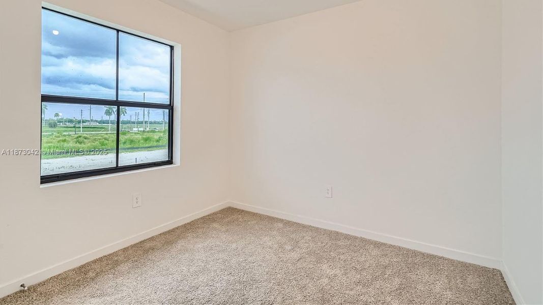 Spacious, unfurnished interior of a new home in Palm Cay, Florida City (Image 17).