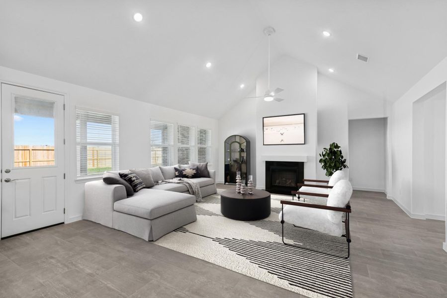 Bright and airy great room with fireplace (*Photo not of actual home and used for illustration purposes only.)