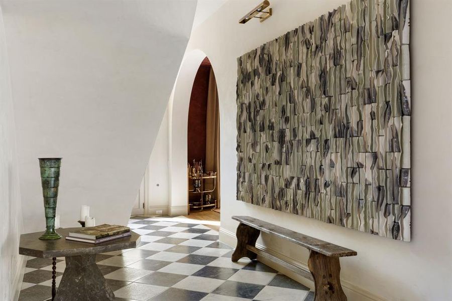 Corridor featuring arched walkways