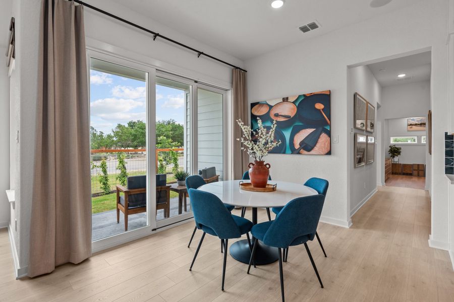 Furnished interior view inside a new home in The Crossvine – Garden Homes, Schertz (Image 9).