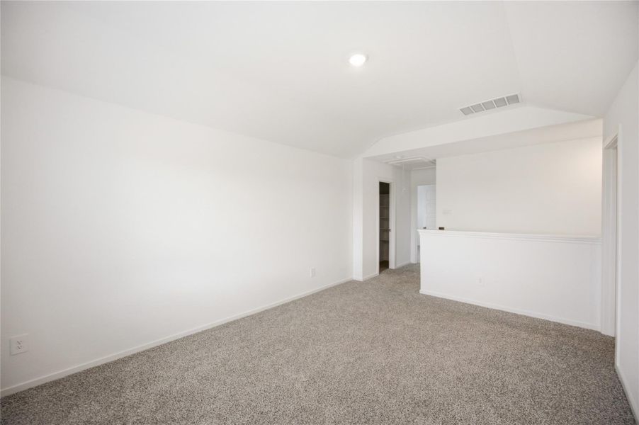 Game room — Versatile upstairs space for media, play, or office use. Game room — Versatile upstairs space for media, play, or office use.