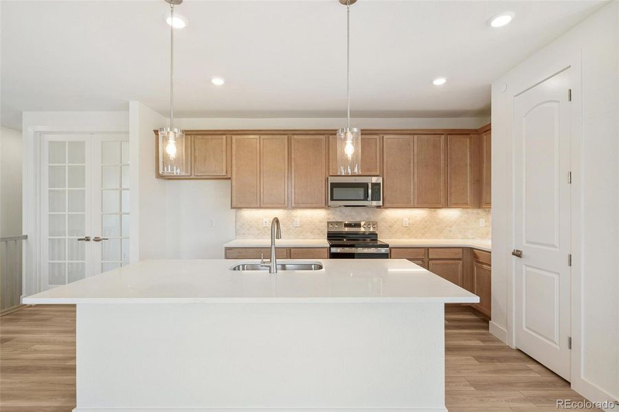 Furnished interior view inside a new home in Legato, Commerce City (Image 9).