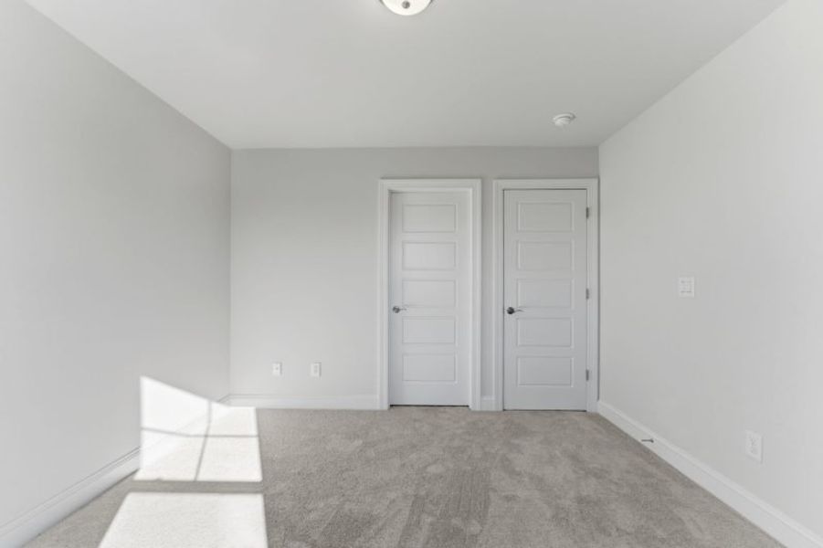 Representative unfurnished interior of a home built from the Fairfield Lux by Keystone Homes NC in Weybridge, Burlington (Image 109).