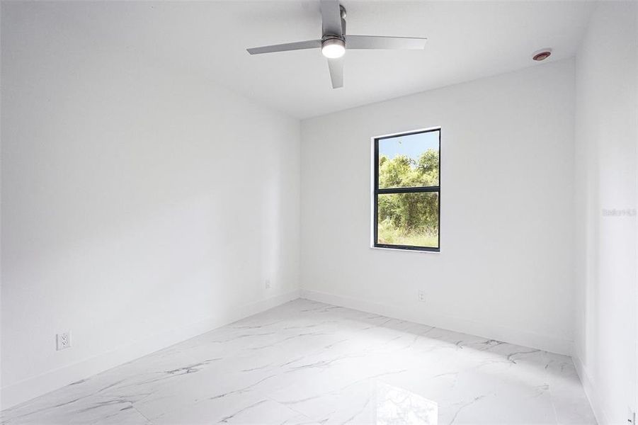 Spacious, unfurnished interior of a new home in , Port Charlotte (Image 15).