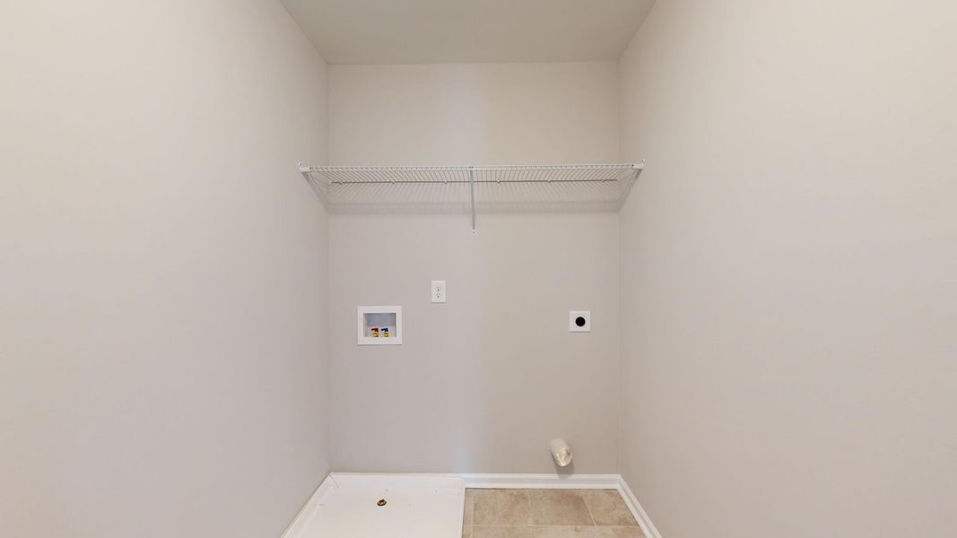 Representative furnished interior of a home built from the Tyler A by JC Jackson Homes,LLC in Heritage Pointe, Newport (Image 9).