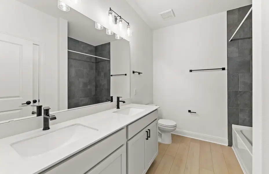 Furnished interior view inside a new home in Crescent Bluff, Georgetown (Image 10). Furnished interior view inside a new home in Crescent Bluff, Georgetown (Image 10).