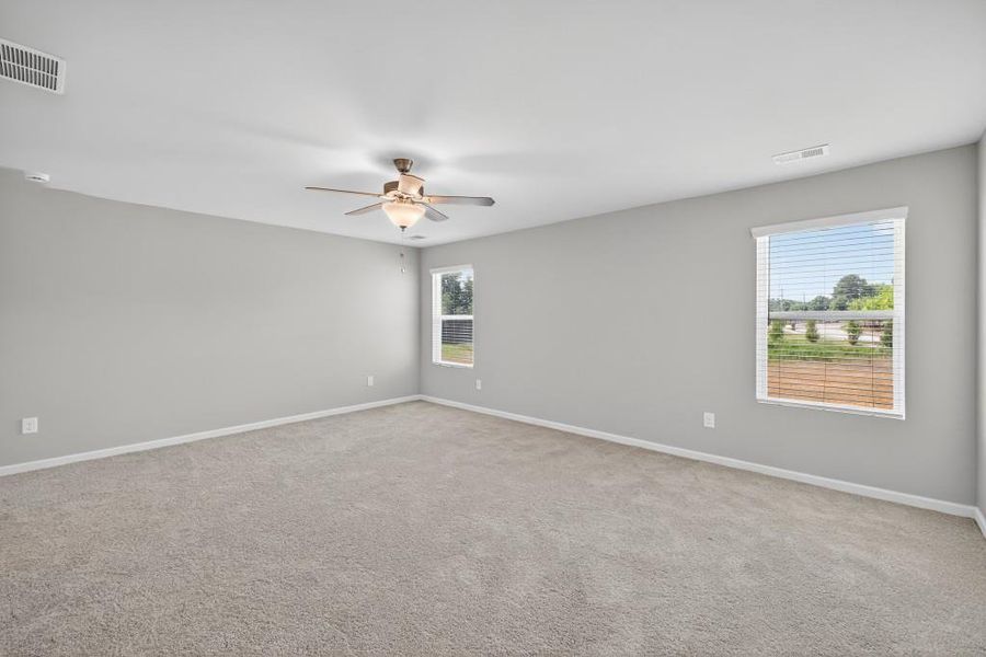 Spacious, unfurnished interior of a new home in The Reserve At Clock Tower, Douglasville (Image 20).