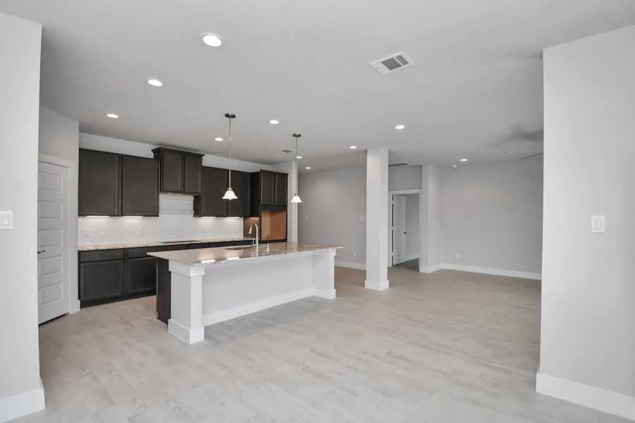 View from the dining room to the kitchen. View from the dining room to the kitchen.