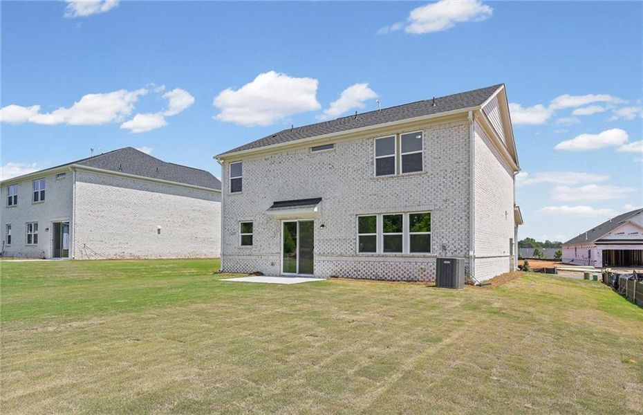 Exterior details and patio area of a home in Overland, Locust Grove (Image 3).